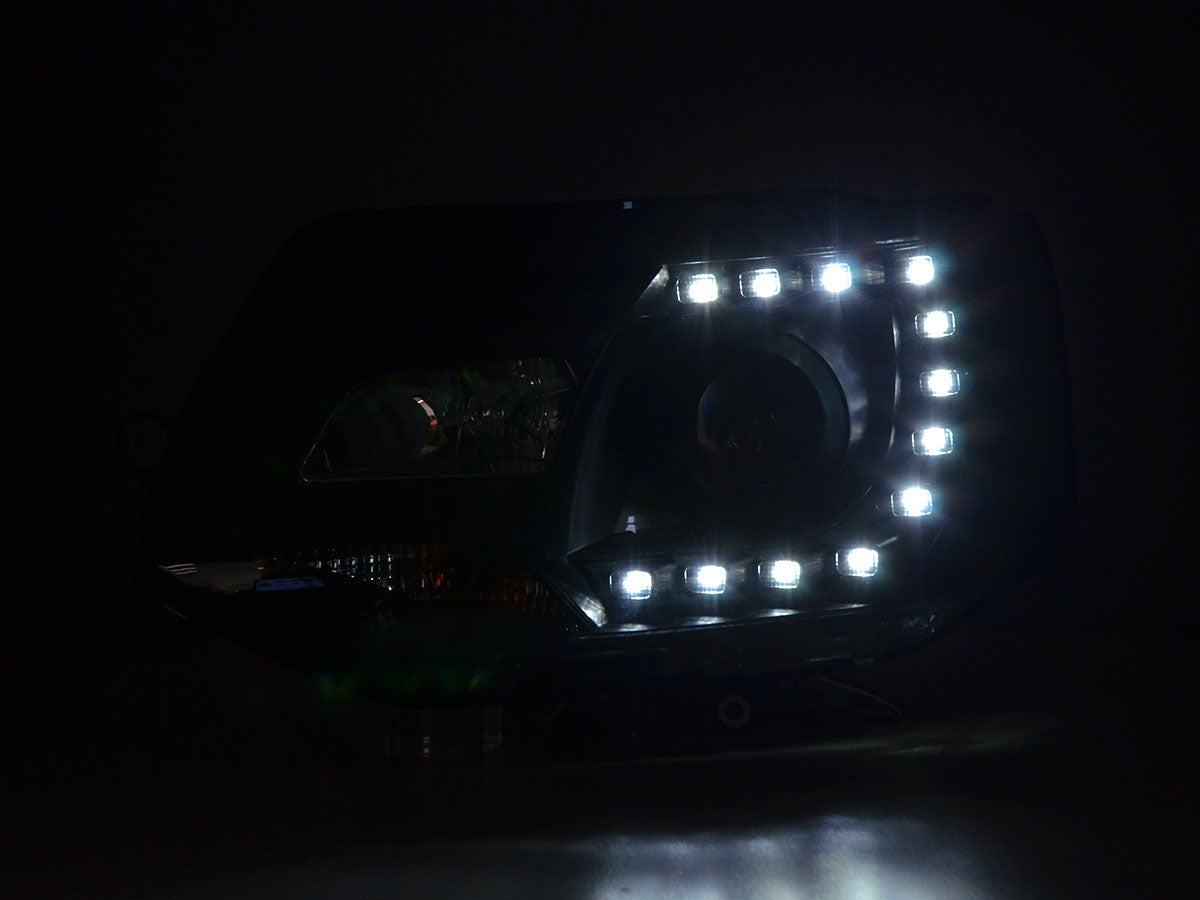 Scheinwerfer Set Daylight LED Tagfahrlicht VW Bus T5 ab 2009 schwarz Scheinwerfer Set Daylight LED Tagfahrlicht VW Bus T5 ab 2009 schwarz